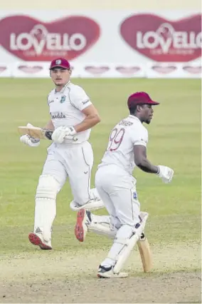  ??  ?? West Indies batsmen Joshua Da Silva (left) and Nkrumah Bonner run between the wickets.