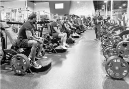  ?? COURTESY OF CRUNCH FITNESS ?? Crunch Fitness staff go through training with protective masks and review new safety guidelines. Florida gyms had been shut down to help slow the spread of the coronaviru­s, but Gov. Ron DeSantis allowed them to reopen Monday at 50% capacity.
