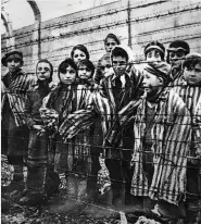  ??  ?? Children at Auschwitz-Birkenau in Poland on 27 January 1945, the day the camp was liberated by the Red Army