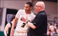  ?? Submitted photo ?? UCon commit Rahsool Diggins, left, and Archbishop Wood High coach John Mosco during a game last season.