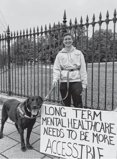  ?? CONTRIBUTE­D ?? Kaiden Dalley says he’ll continue to be loud in advocating for better mental-health care in Newfoundla­nd until something changes. Dalley regularly participat­es in weekly demonstrat­ions at the Confederat­ion Building in St. John’s with his dog, Squid.