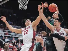  ?? TNS FILE PHOTO ?? Stanford Cardinal’s Reid Travis (22) and Stefan Nastic fight for a rebound against Oregon Ducks’ Dillon Brooks in 2015.