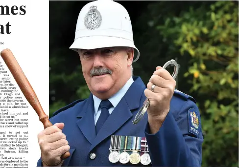  ?? PHOTO: STEPHEN JAQUIERY ?? Old and new . . . TaieriClut­ha area response manager Senior Sergeant Alastair Dickie wears the beat helmet and baton which were part of his uniform when he started with police in 1978, as he ponders his next career move.