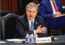  ?? PATRICK SEMANSKY/ASSOCIATED PRESS ?? FBI Director Christophe­r Wray, testifying before the Senate Judiciary Committee on Capitol Hill on Tuesday, condemned the Jan. 6 attack on the U.S. Capitol as “domestic terrorism.”