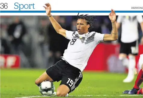  ?? AFP ?? Anders als im Test gegen Österreich wird Leroy Sané das Trikot der DFB-Elf in Russland nicht überstreif­en können.