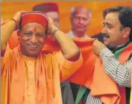  ??  ?? Uttar Pradesh CM Yogi Adityanath along with BJP’s Arki candidate Rattan Singh Pal (right) during a party rally at Jainagar village in Solan district on Sunday. RAVI KUMAR/HT