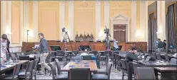  ?? AP ?? Crews prepare the Cannon Caucus Room for Thursday night's hearing at the Capitol in Washington.