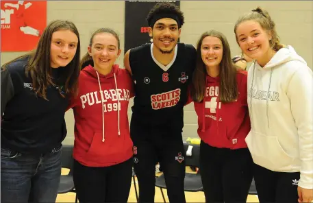  ?? Photo by Eamonn Keogh ?? Aaron Jackson, Scotts Lakers, meets some fans after the National League game in Killarney on Sunday.