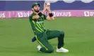  ?? Photograph: Scott Barbour/EPA ?? Shaheen Afridi takes a catch to dismiss England's Harry Brook but the Pakistan bowler hurt himself in the process.