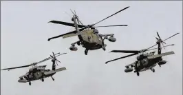  ?? VADIM GHIRDA / ASSOCIATED PRESS 2017 ?? According to a Pentagon report, U.S. Army-made Black Hawk helicopter­s are less capable for some missions conducted by Afghanista­n’s Air Force than the Russianmad­e ones they’re replacing.