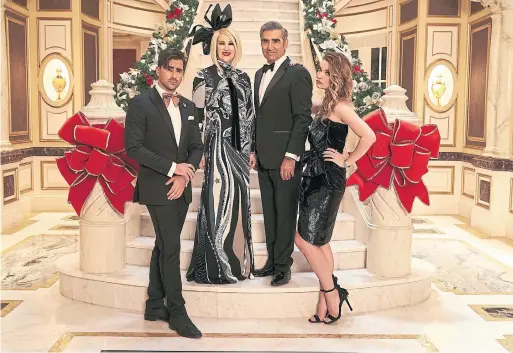 ?? CBC ?? In the Schitt’s Creek holiday special, we get a glimpse of glam Christmase­s past with Daniel Levy, Catherine O'Hara, Eugene Levy and Annie Murphy.