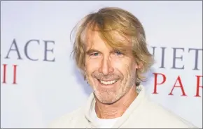  ?? Charles Sykes / Associated Press ?? The union that represents film actors is telling its members not to work on the pandemic thriller “Songbird,” produced by Michael Bay, above. It is one of the first films in production after coronaviru­s closures.