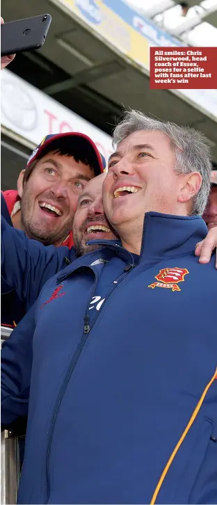  ??  ?? All smiles: Chris Silverwood, head coach of Essex, poses for a selfie with fans after last week’s win