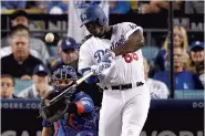  ??  ?? Yasiel Puig, des Dodgers, a claqué un coup de circuit à la septième manche.