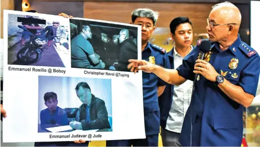  ??  ?? MURDER SUSPECTS – During a press conference at Camp Crame Thursday, PNP chief Oscar Albayalde points to pictures of Emmanuel Rosilio, Christophe­r Naval, and Emmanuel Juavar whom he identified as suspects in the killing of Congressma­n Rodel Batocabe. (Kevin Espiritu)