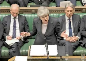  ?? MARK DUFFY/UK PARLIAMENT VIA AP ?? Britain’s Prime Minister Theresa May speaks Wednesday during Prime Minister’s Questions in the House of Commons, London.