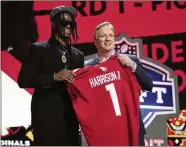  ?? ?? Wide receiver Marvin Harrison Jr. went fourth to the Cardinals and was the first nonquarter­back drafted. His dad was a first-round pick by the Colts in 1996 and was inducted into the Pro Football Hall of Fame in 2016.