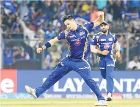  ?? Picture / AP ?? Mitchell McClenagha­n taken 12 wickets for Mumbai, being easily their most successful bowler and the second-best wicket taker in the IPL.