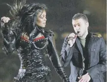  ??  ?? 0 Janet Jackson and Justin Timberlake perform at the Super Bowl before the former’s ‘wardrobe malfunctio­n’