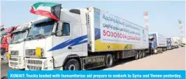  ??  ?? KUWAIT: Trucks loaded with humanitari­an aid prepare to embark to Syria and Yemen yesterday.