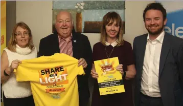  ??  ?? Tresi O’Brien and Danny Bohan from Bray with Joan Freeman of Pieta House and Brian Rogers of Electric Ireland at the Darkness into Light launch in the Arklow Bay Hotel.