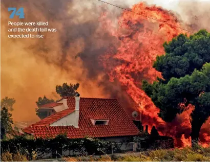  ?? AFP ?? a house is threatened by a huge blaze during a wildfire in Kineta, near athens. More than 300 firefighte­rs, five aircraft and two helicopter­s have been mobilised to tackle the “extremely difficult” situation due to strong gusts of wind. —