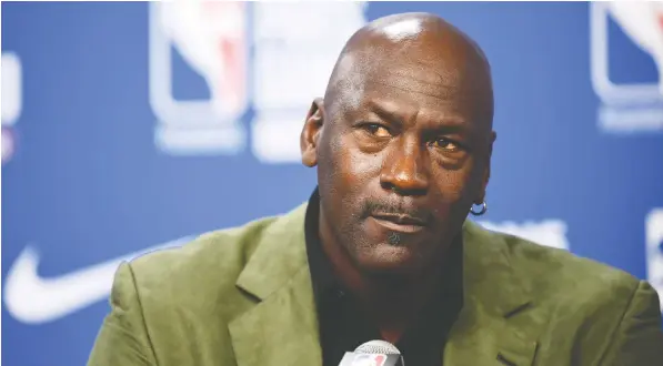  ?? FRANCK FIFE/AFP VIA GETTY IMAGES FILE ?? Michael Jordan, basketball hall-of-famer and majority owner of the NBA’s Charlotte Hornets, says the death of George Floyd, who was black, while in the custody of white police officers in Minneapoli­s on May 25 was a “tipping point” in American society.