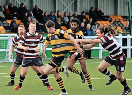  ?? ?? BREAK: Stafford’s Kevin van der Leest looks for a way through the Tamworth defence at the weekend.