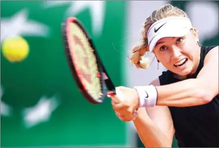  ?? ANNE-CHRISTINE POUJOULAT/AFP ?? Russia’s Anastasia Potapova returns the ball to Germany’s Angelique Kerber during their women’s singles first round match on day one of The Roland Garros 2019 French Open tennis tournament in Paris on Sunday.