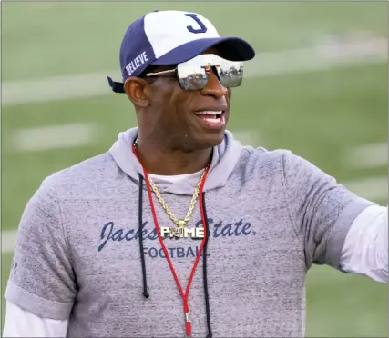  ?? ASSOCIATED PRESS FILE PHOTO ?? Jackson State head coach Deion Sanders points during a game against Louisiana Monroe earlier this season. Travis Hunter, the No. 1high school football recruit in the country, pulled a signing day shocker Wednesday, deciding to attend Jackson State, an FCS school.