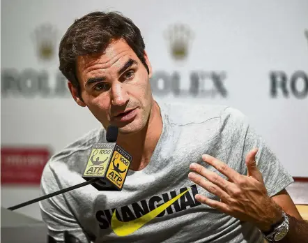  ?? — AFP ?? Eager for action: Roger Federer speaking at a press conference at the Shanghai Masters in Shanghai on yesterday.