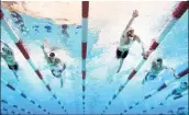  ??  ?? (L-R) Brett Pinfold, Daniel Krueger, Zach Apple, Drew Kibler and Tom Shields compete in the men's 100 Meter Freestyle heats in the Pro Swim Series on Sunday.