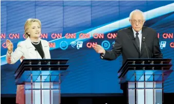  ??  ?? Hillary Clinton y Bernie Sanders protagoniz­aron un acalorado debate en el que se recriminar­on las capacidade­s de cada cual para ser presidente de EE.UU.