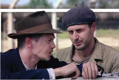 ??  ?? STEVE BUSCEMI and David Arquette in ‘The Grey Zone,’ the 2001 Holocaust film. Though largely forgotten 20 years after its release, Tim Blake Nelson’s (left) acclaimed drama has proven hugely influentia­l.