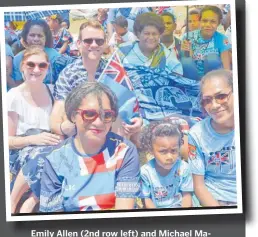  ?? Picture: REINAL CHAND ?? Emily Allen (2nd row left) and Michael Macartney of England join the Fijian people to celebrate Fiji’s Independen­ce Day at Prince Charles Park Nadi.