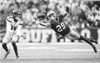  ?? David Dermer / Associated Press ?? Ex-Texans cornerback Kevin Johnson, right, has played in every game for the Bills this season.