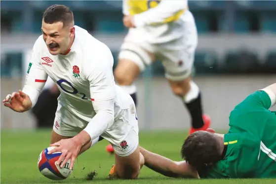  ??  ?? Wonder try: Jonny May scores against Ireland