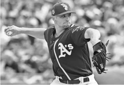  ?? MATT KARTOZIAN, USA TODAY SPORTS ?? Kendall Graveman, who is 1-1 with a 2.84 ERA in 122⁄ innings pitched in spring training, is expected to start for the A’s on opening day.