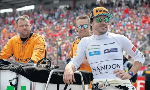  ??  ?? Fernando Alonso, en la parrilla del GP de Alemania de 2018 durante la que fue su última temporada en la Fórmula 1 con McLaren.