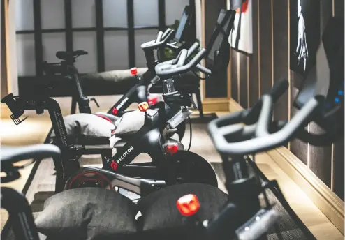  ?? JEENAH MOON / BLOOMBERG FILES ?? Peloton Interactiv­e Inc. markets its high-end exercise bikes to home fitness enthusiast­s
and has used patents to go after rivals it says are cutting into its business.