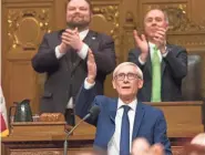  ?? MARK HOFFMAN / MILWAUKEE JOURNAL SENTINEL ?? Gov. Tony Evers blows a kiss to his wife, Kathy, before delivering his State of the State address at the Capitol in Madison.