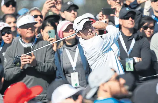  ?? SEAN M. HAFFEY GETTY IMAGES ?? Canadian Nick Taylor drew a crowd on the ninth tee of Sunday’s final round of the Pebble Beach Pro-Am, on the way to winning wire to wire.