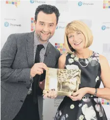  ??  ?? Lynn Green being presented with her award from Daniel Mays.