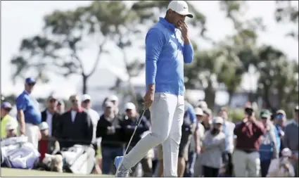  ?? AP PHOTO/LYNNE SLADKY ?? Brooks Koepka reacts after missing a putt on the eighth hole during the first round of the Honda Classic golf tournament, on Thursday, in Palm Beach Gardens, Fla.