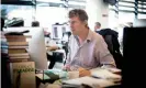  ??  ?? Luke Harding in the Guardian’s London newsroom in 2018. Like most staff, he is now working from home. Photograph: Alicia Canter/The Guardian