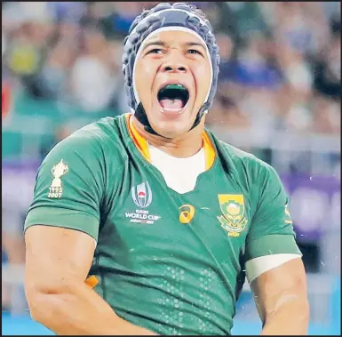  ?? Picture: REUTERS ?? Cheslin Kolbe celebrates scoring their first try.