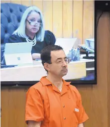  ?? DALE G. YOUNG/DETROIT NEWS VIA AP ?? Larry Nassar was sentenced to between 40 and 125 years in prison Monday for sexually abusing athletes at an elite gymnastics club. It was the third sentence for Nassar.