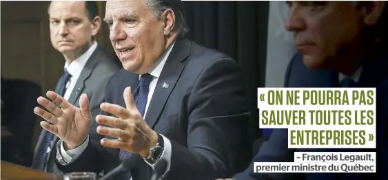  ?? PHOTO SIMON CLARK ?? Après les mesures draconienn­es « prises pour sauver des vies », le premier ministre François Legault (au centre) jugeait urgent de venir en aide aux entreprise­s affectées par la pandémie mondiale. M. Legault est flanqué des ministres Girard et Fitzgibbon.