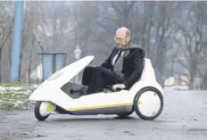 ?? ?? Sir Clive Sinclair launches his new electric vehicle, the Sinclair C5, at Alexandra Palace, London on this day in 1985