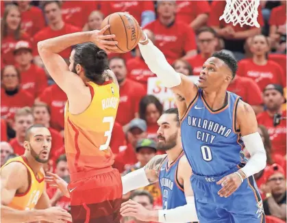  ?? CHRIS NICOLL/USA TODAY SPORTS ?? After Ricky Rubio’s triple-double, Russell Westbrook (0) vowed he’d stop the Jazz guard.